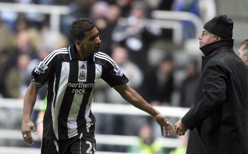 FILE - Then-Newcastle United player Habib Beye, left, celebrates his goal against Birmingham City with manager Sam Allardyce during their English Premier League soccer match at St James' Park, Newcastle, England, on Dec. 8, 2007. For Muslim soccer players in deeply secular France, observing Ramadan is a tall order. Wielding a principle of religious neutrality enshrined in the French constitution, the country's soccer federation does not accomodate players who want to fast and refrain from drinking or eating from sunrise to sunset. (AP Photo/Scott Heppell, File)