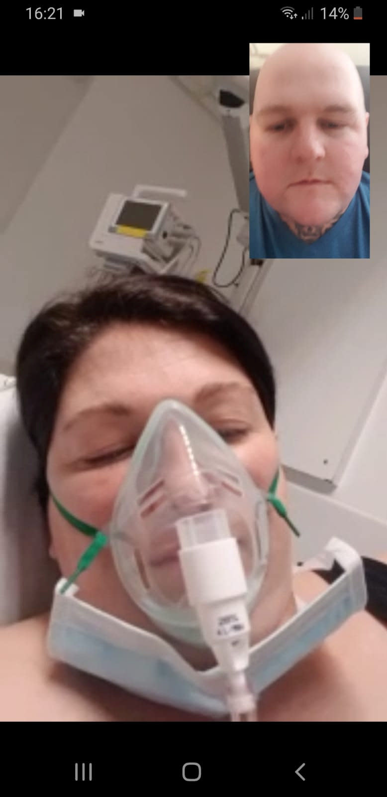 Danielle was in an induced coma for 10 days while pregnant with the twins, pictured here face-timing her partner. (SWNS)