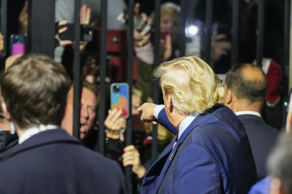 Republican presidential candidate and former President Donald Trump arrives before an NCAA college football game between the University of South Carolina and Clemson Saturday, Nov. 25, 2023, in Columbia, S.C. (AP Photo/Chris Carlson)