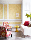 <p> A living room wallpaper is a fabulous way to bring color into a space. A mural or a large-scale design can make a  bold statement but is not for everyone. For something that's easy to live with choose a small-scale repeat design such as the joyful Honeysuckle design from Jane Churchill in this yellow living room idea. </p> <p> Setting it within wall paneling will also help calm the look. While this paper appears sunshine yellow at first glance, it does in fact have an array of colors within it including pink and red which have here been drawn out as accent colors and used on the upholstery to create a playful contrast. </p>