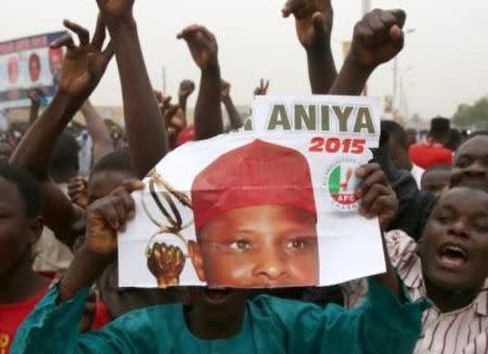 Supporters of the presidential candidate Muhammadu Buhari and his All Progressive Congress (APC) party celebrate in Kano March 31, 2015. Nigeria's opposition APC declared an election victory on Tuesday for former military ruler Buhari and said Africa's most populous nation was witnessing history with its first democratic transfer of power. REUTERS/Goran Tomasevic