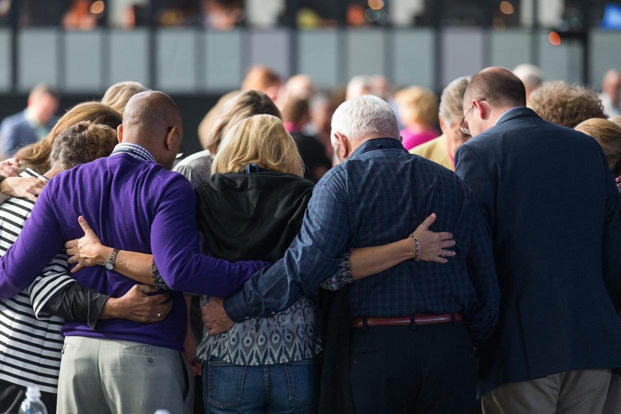 Delegates at the UMC General Conference in 2016 pray following a controversial plenary. The denomination's top legislative assembly is set to convene in Charlotte for two weeks starting April 22, 2024 in the legislative assembly's first regular session since 2016.