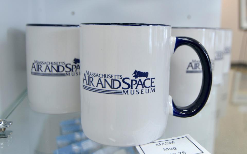 Mugs await visitors in the gift shop area of the Massachusetts Air and Space Museum, which has recently moved to 438 Main St. in Hyannis.