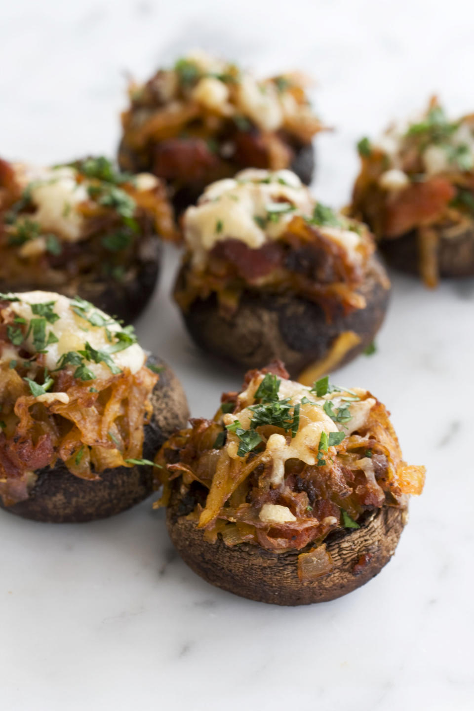 In this image taken on April 22, 2013, chorizo hash stuffed mushroom caps are shown in Concord, N.H. (AP Photo/Matthew Mead)