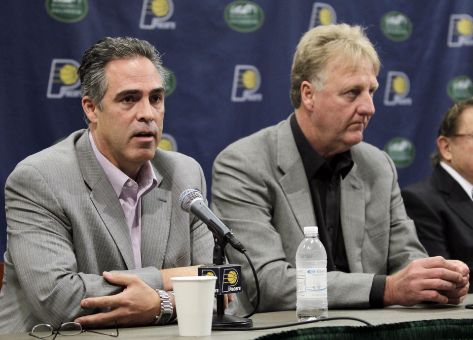 Kevin Pritchard, left, talks about his role as the new general manger of the Indiana Pacers as Larry Bird listens during an announcement by the NBA basketball team in Indianapolis, Wednesday, June 27, 2012. Bird stepped down as president of the team and will be replaced by Donnie Walsh. (AP Photo/Michael Conroy)