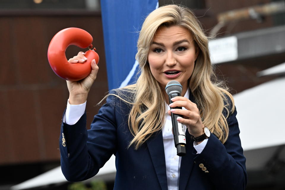 Ebba Busch, party leader of the Christian Democrats, gives a campaign speech in central Stockholm, Sweden, Saturday, Sept. 10, 2022. General elections will be held in Sweden Sunday. (Jonas Ekstromer/TT News Agency via AP)