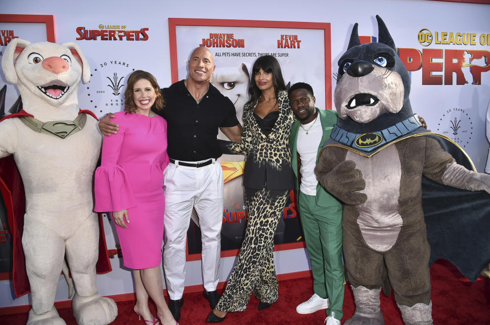 FILE - Vanessa Bayer, from left, Dwayne Johnson, Jameela Jamil and Kevin Hart arrive at the premiere of "DC League of Super Pets" on Wednesday, July 13, 2022, at The Grove, AMC 14 in Los Angeles. The first “National Cinema Day” nationwide promotion appeared to work with the highest-attended day of 2022, drawing an estimated 8.1 million moviegoers on Saturday, Sept. 3, 2022, according to The Cinema Foundation. The top performing titles for the day included "Spider-Man: No Way Home," “Top Gun: Maverick,” “DC League of Super Pets” and “Bullet Train.” (Photo by Richard Shotwell/Invision/AP, File)