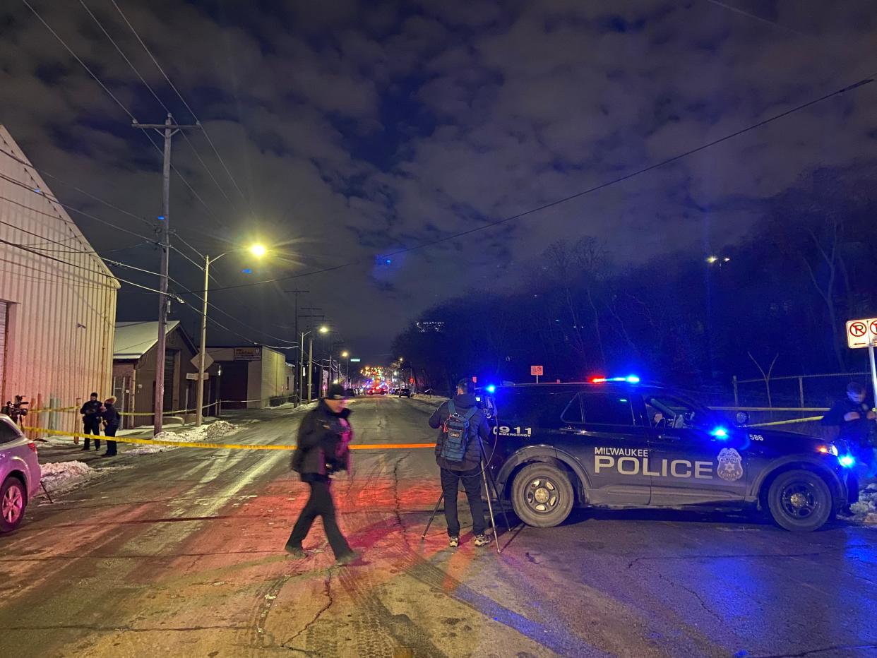 Milwaukee police investigate the shooting that left an officer and another man injured Thursday night on West St. Paul Avenue in the Menomonee Valley. It is the second time in two days that an officer was shot in Milwaukee.