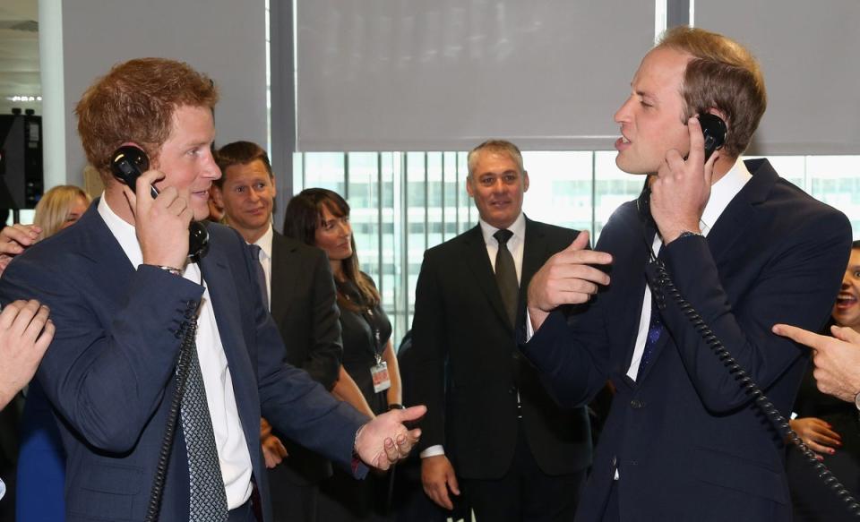 Prince Harry and the Duke of Cambridge on the trading floor during the BGC Partners Charity Day in London’s Docklands (PA)