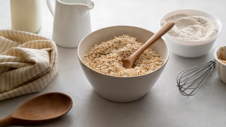 Bowl of oatmeal with ingredients