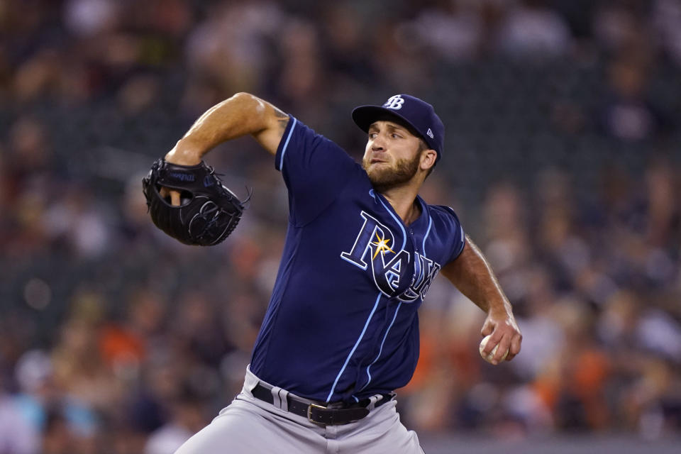 Tampa Bay Rays relief pitcher Colin Poche throws during the ninth inning of a baseball game against the Detroit Tigers, Friday, Aug. 5, 2022, in Detroit. (AP Photo/Carlos Osorio)
