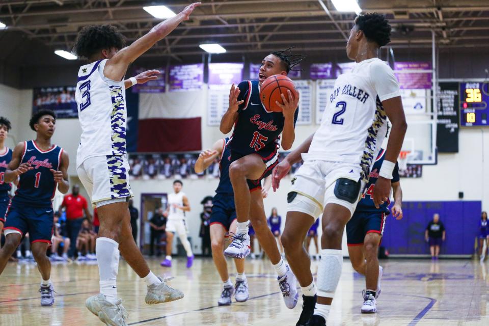 Veterans Memorial's Sean Mondragon (15) attempts a layup in a high school basketball game against Miller on Tuesday, Dec. 6, 2022 at Miller High School in Corpus Christi, Texas. The Eagles won 69-65.