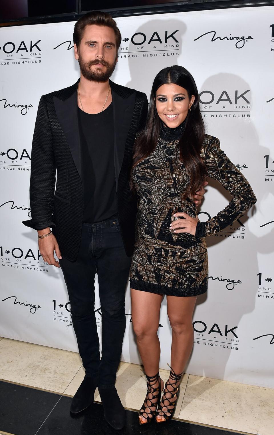 Scott Disick (L) and Kourtney Kardashian arrive at his birthday celebration at 1 OAK Nightclub at The Mirage Hotel & Casino on May 23, 2015 in Las Vegas, Nevada