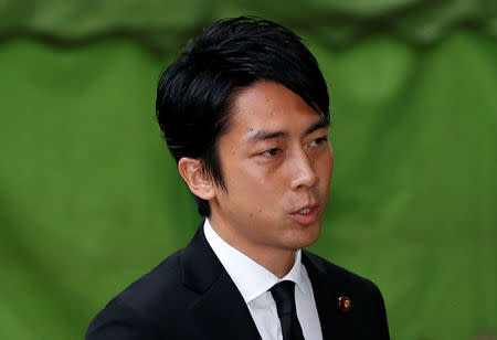 Shinjiro Koizumi, a Japanese lawmaker from the ruling Liberal Democratic Party and son of former Prime Minister Junichiro Koizumi, leaves after visiting the Yasukuni Shrine in Tokyo, Japan, August 15, 2017, to mark the 72nd anniversary of Japan's surrender in World War Two. REUTERS/Issei Kato