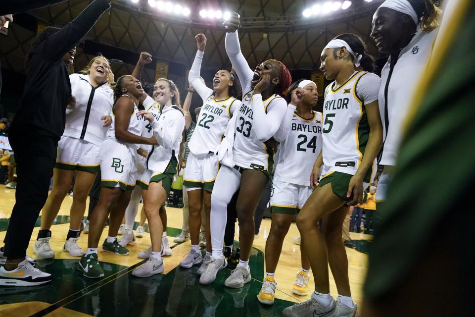 Baylor players react after defeating Utah 84-77 during an NCAA college basketball game, Tuesday, Nov. 14, 2023, in Waco, Texas. | Julio Cortez, Associated Press