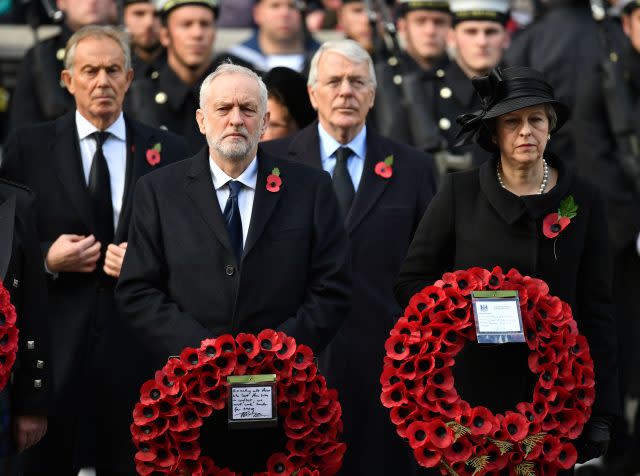 Labour leader Jeremy Corbyn stands next to Prime Minister Theresa May, with former prime ministers Tony Blair (left) and Sir John Major behind them