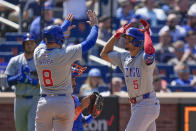 Chicago Cubs' Christopher Morel, right, celebrates his three-run homer with teammates during the fifth inning of a baseball game against the New York Mets at Citi Field, Thursday, May 2, 2024, in New York. (AP Photo/Seth Wenig)