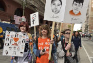 <p>Women hold signs as they attend the March For Our Lives LA in Los Angeles, California. (Rodin Eckenroth/Getty Images) </p>