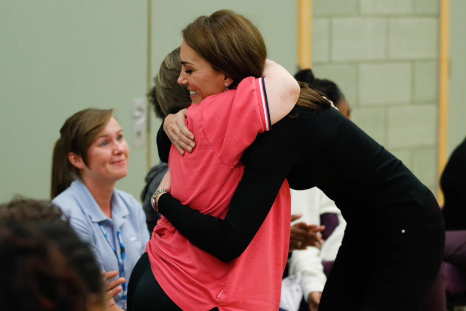 The Duchess of Cambridge hugs a participant as she meets new apprentices and graduates from the Coach Core Essex apprenticeship scheme during a charity sporting event. Source: Getty