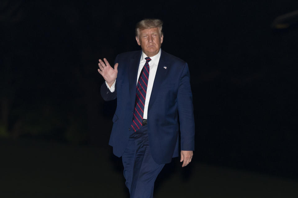 President Donald Trump waves after stepping off Marine One on the South Lawn of the White House, Tuesday, Sept. 15, 2020, in Washington. Trump is returning from Philadelphia. (AP Photo/Alex Brandon)