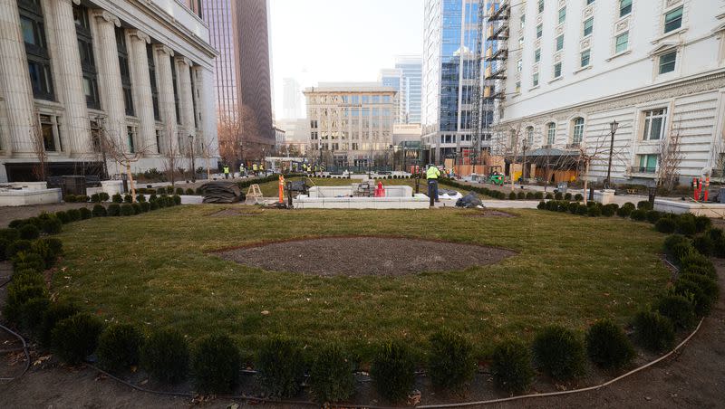 The new plaza looking south between the Church Administration Building, left, and the Joseph Smith Memorial Building, right, on Temple Square.