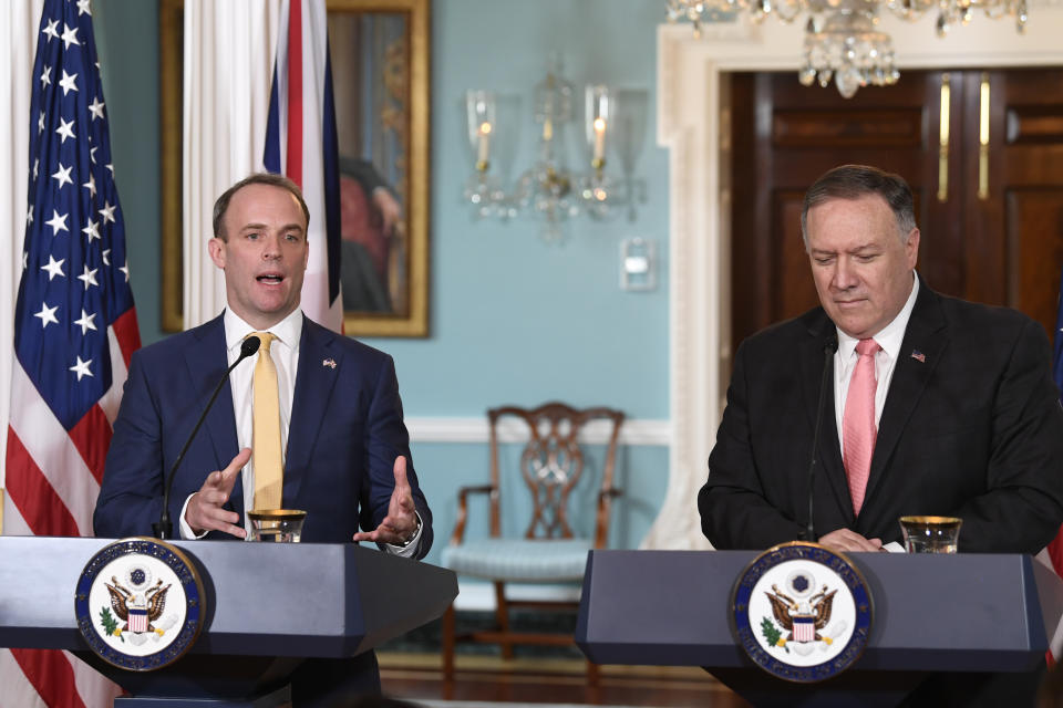 Secretary of State Mike Pompeo, right, listens as Britain's Foreign Secretary Dominic Raab, left, speaks during a press availability at the State Department in Washington, Wednesday, Aug. 7, 2019. (AP Photo/Susan Walsh)
