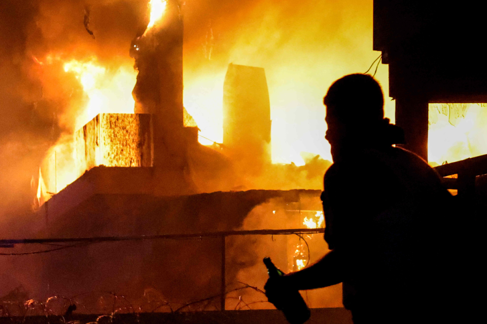 A building was set on fire near the US Embassy in Beirut (AFP via Getty Images)