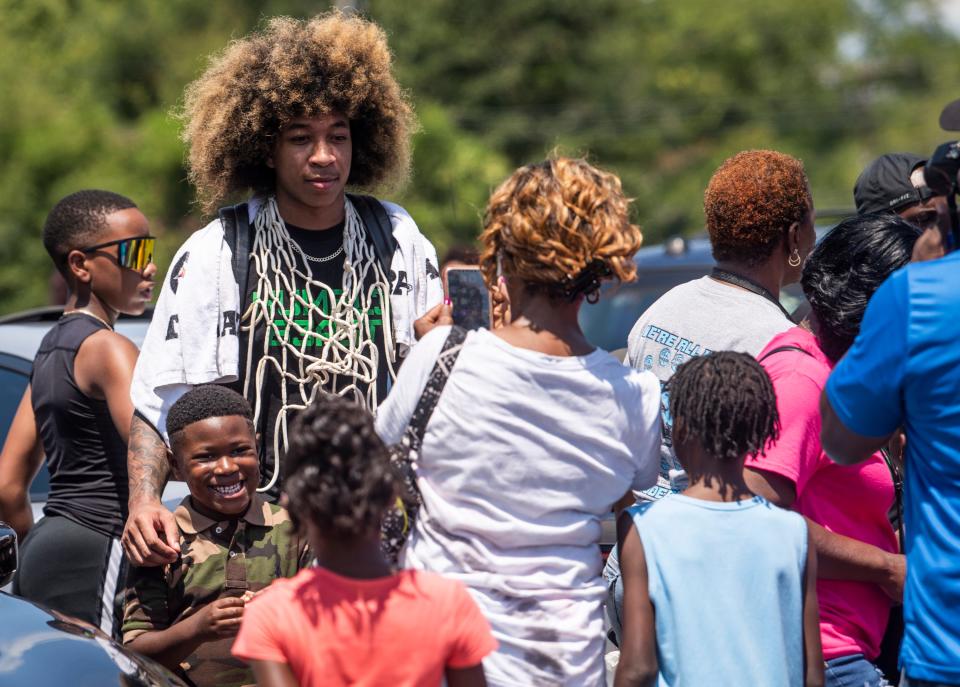 JD Davison poses for pictures following a parade honoring the hometown star in Fort Deposit, Ala., on Saturday, Aug. 13, 2022. Davison a graduate of Calhoun High School was just drafted by the Boston Celtics in the 2022 NBA Draft. 