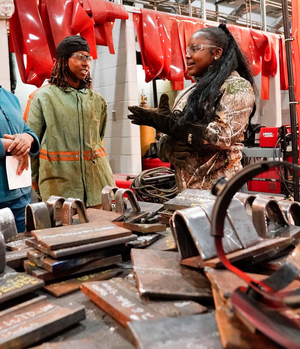 Destiny Smith and Kayla Robinson, juniors at Hillcrest High, are welding students studying in the Career Technical Education Annex Thursday, Nov. 30, 2023.