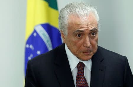 FILE PHOTO: Brazil's President Michel Temer attends a ceremony to approve the goal of the National Biofuels Policy RenovaBio at the Planalto Palace in Brasilia, Brazil, June 5, 2018. REUTERS/Adriano Machado