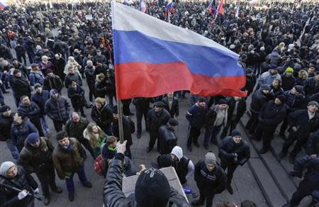 Pro-Russian demonstrators attend a rally in Donetsk March 9, 2014. REUTERS/Konstantin Chernichkin