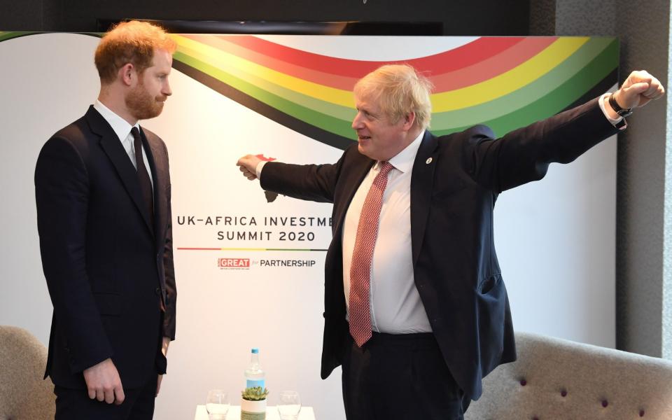 Prince Harry and Boris Johnson talking at the UK-Africa Investment Summit - Getty Images Europe