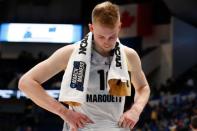 Mar 21, 2019; Hartford, CT, USA; Marquette Golden Eagles forward Sam Hauser (10) walks off of the court after a loss to the Murray State Racers in the first round of the 2019 NCAA Tournament at XL Center. Mandatory Credit: David Butler II-USA TODAY Sports