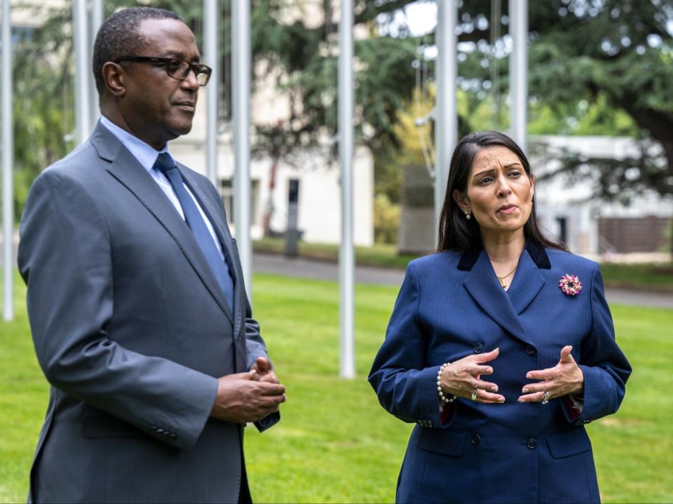 Home secretary Priti Patel, pictured with Rwandan foreign minister Vincent Biruta, faces ongoing criticism over the scheme (AP)