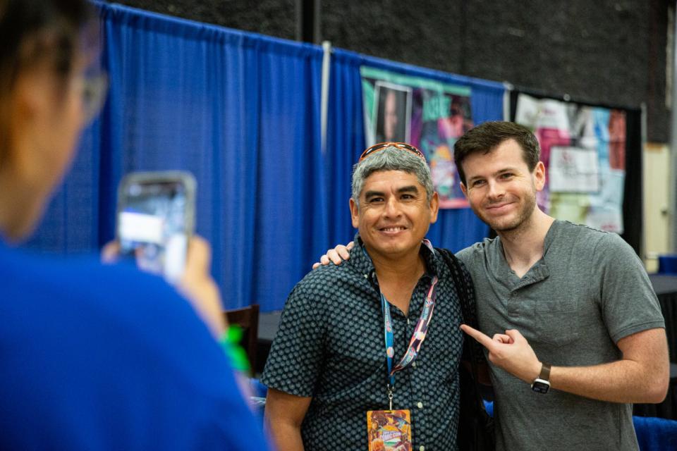 Tony Martinez, of Corpus Christi, poses for a photo with Chandler Riggs at Corpus Christi Comic Con in the American Bank Center on Friday, July 28, 2023.