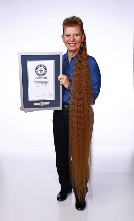 Tami Manis – Longest Mullet (Female) Guinness World Records 2023 (Photo Credit: Wade Payne/Guinness World Records)