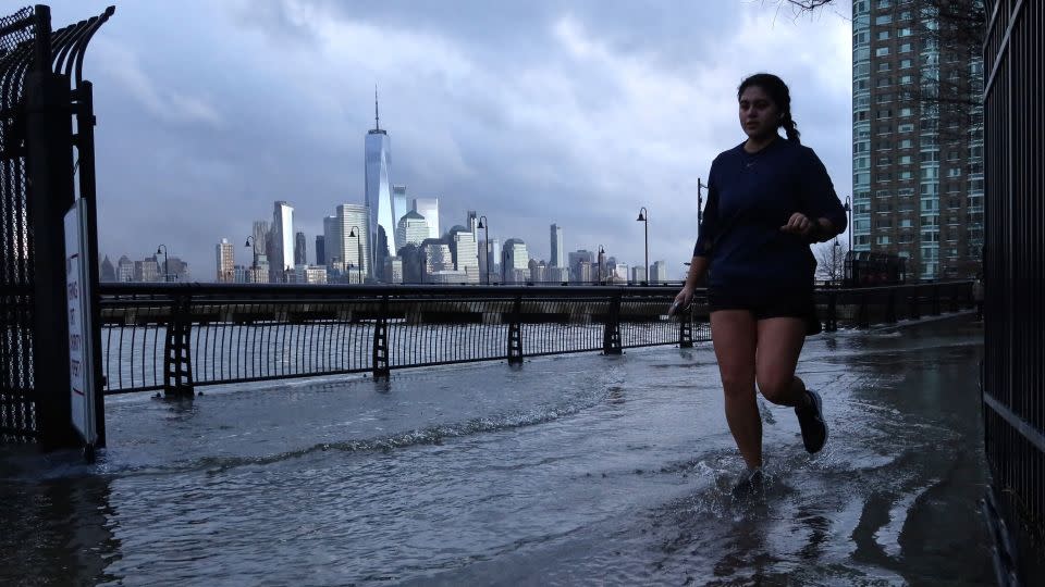 Water from the Hudson River overflowed a river wall on January 13, 2024, in Jersey City, New Jersey. - Gary Hershorn/Corbis News/Getty Images