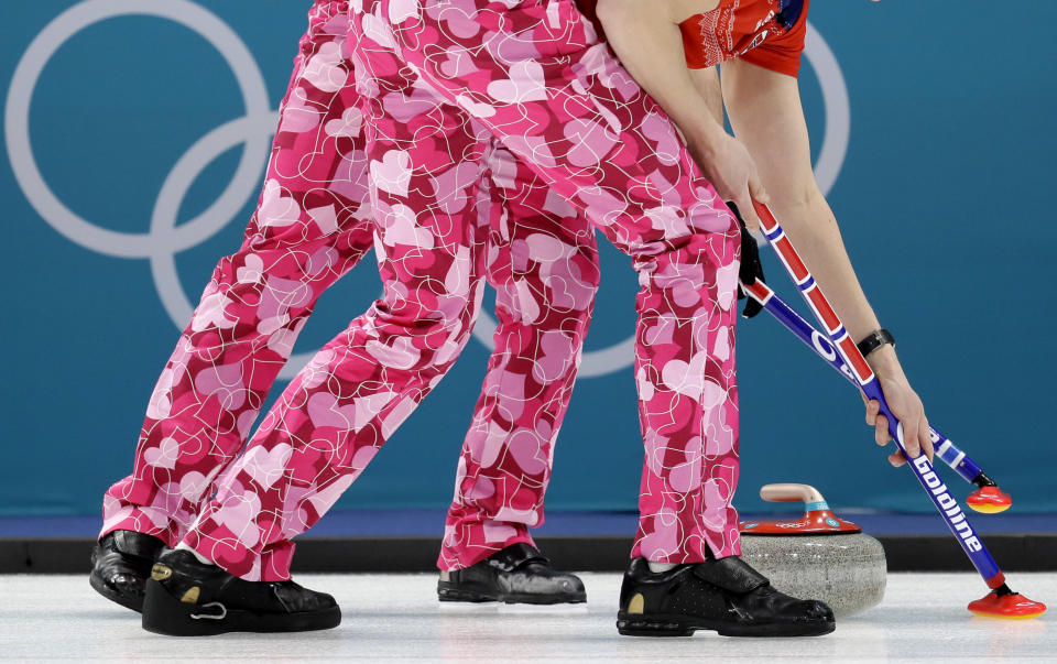 The men’s curling team from Norway wore Valentine’s Day-themed pants for their match on Wednesday. (AP)