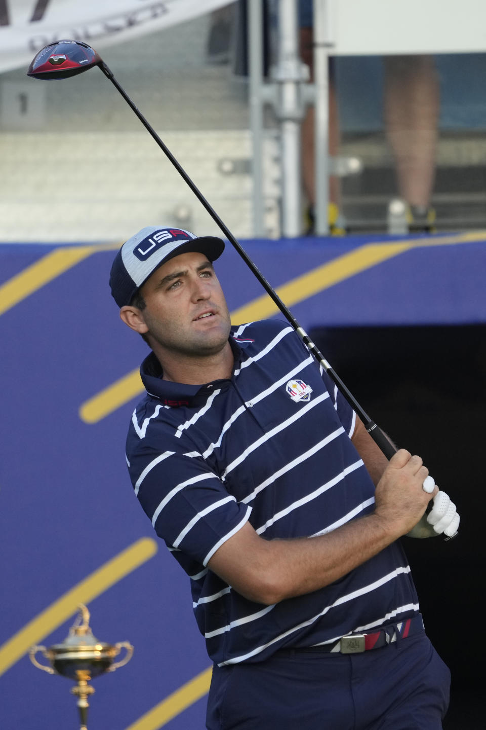 United States' Scottie Scheffler looks at his shot from the 1st tee during his morning Foursome match at the Ryder Cup golf tournament at the Marco Simone Golf Club in Guidonia Montecelio, Italy, Friday, Sept. 29, 2023. (AP Photo/Andrew Medichini)