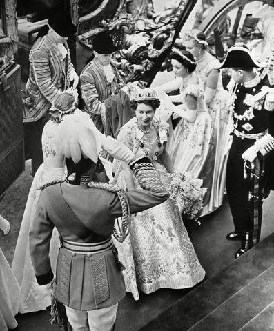 Historia/Shutterstock The Queen and her maids on her coronation day in 1953
