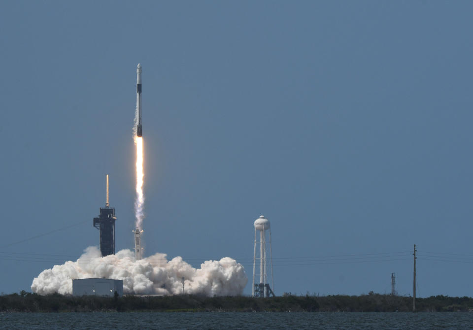 SpaceX's Crew Dragon spacecraft shown launching successfully from Pad 39A at the Kennedy Space Center.