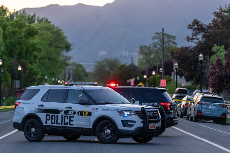Salt Lake City Police SUVs parked near West Indiana and Navajo Street following a domestic violence-related shooting. (Courtesy of SLCPD)