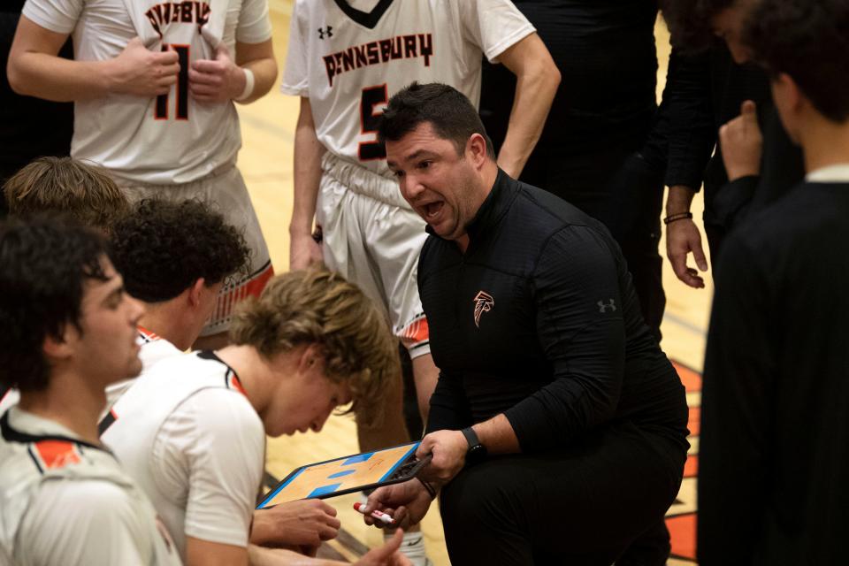 Pennsbury boys basketball head coach Wes Emme gives instructions to his team during a January 2023 game.