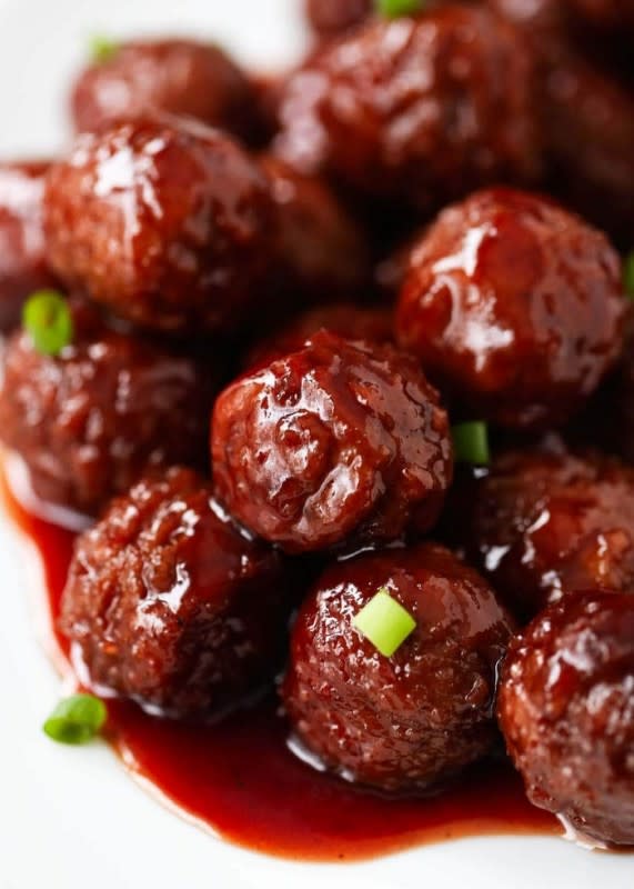 <p>I Heart Naptime</p><p><strong>Recipe: <a href="https://www.iheartnaptime.net/bbq-meatballs/" rel="nofollow noopener" target="_blank" data-ylk="slk:Crock Pot Grape Jelly and BBQ Meatballs;elm:context_link;itc:0;sec:content-canvas" class="link rapid-noclick-resp">Crock Pot Grape Jelly and BBQ Meatballs</a></strong></p>