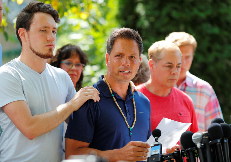 <p>Don Damond is comforted by his son Zach Damond as he speaks to the media about his fiance, Justine Damond who was fatally shot by Minneapolis police in Minneapolis, Minnesota, July 17, 2017. (Photo: Adam Bettcher/Reuters) </p>