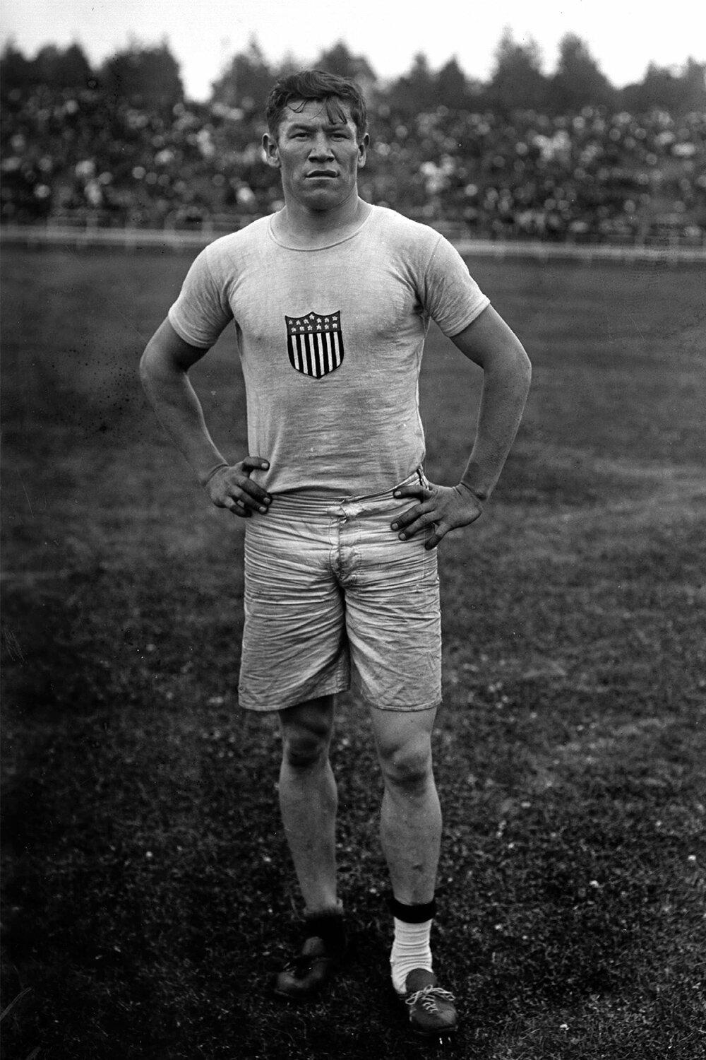 American athlete Jim Thorpe (1888 -1953) at an athletics meeting at the Parc Pommery in Reims, France, 23rd July 1912. Thorpe is competing in the 110 yards Hurdles. BRA-75991.