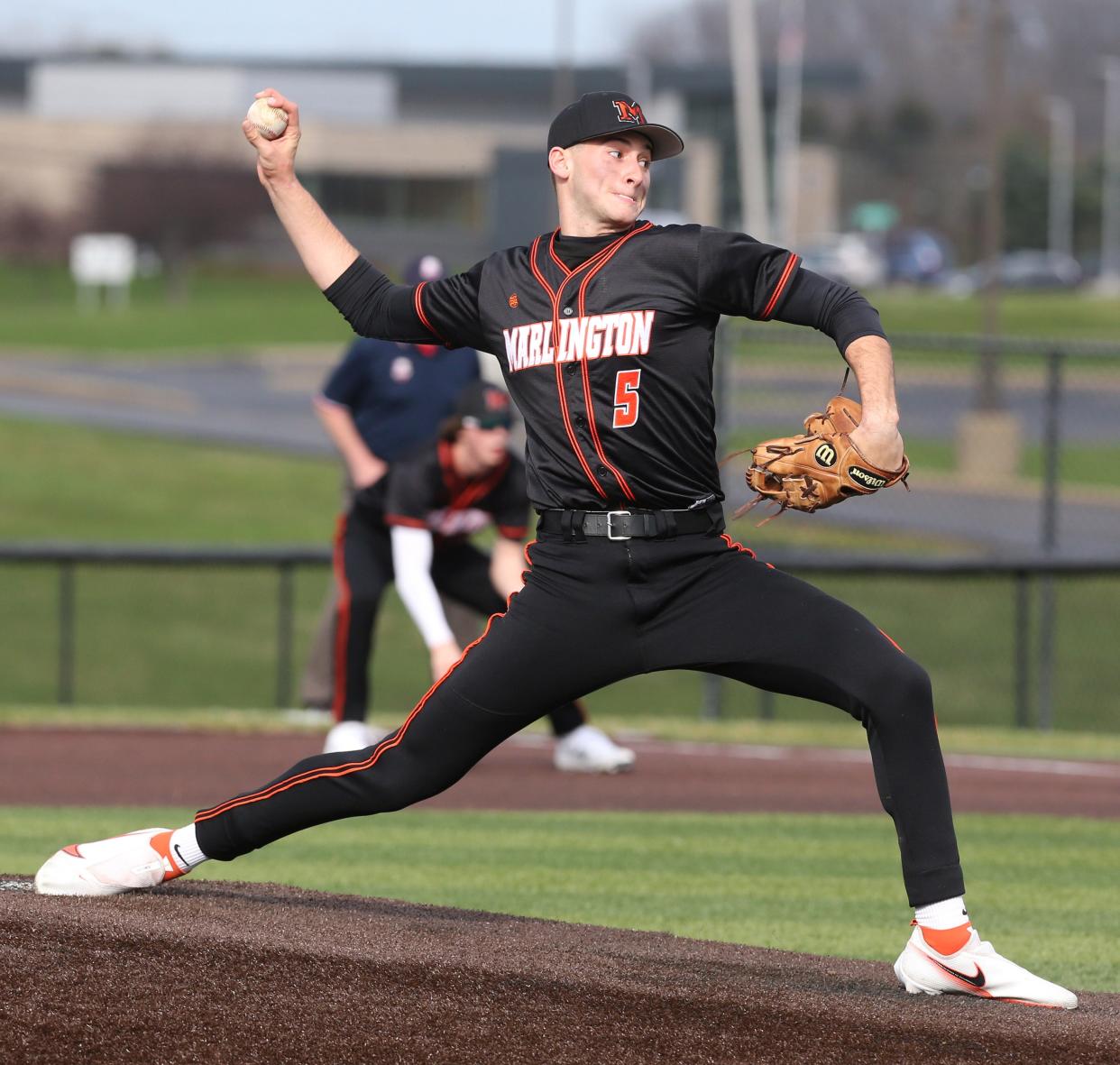 Connor Evanich of Marlington delivers a pitch during their game at Jackson on Wednesday, April 13, 2022. 