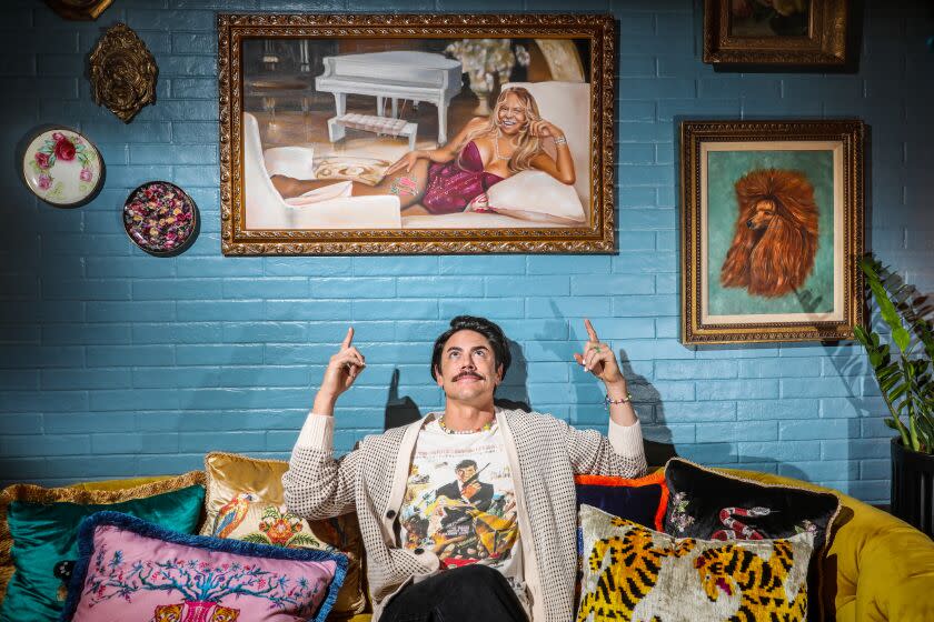 Los Angeles, CA - January 20: Tom Sandoval, one of the stars of reality TV's "Vanderpump Rules," a spin-off of "The Real Housewives of Beverly Hills," sits beneath a painting comissioned to represent a lucid dream he had, imagining a relationship with James Earl Jones, but with a female body, photographed in the entry of his new restaurant, Schwartz & Sandy's, he runs with his series co-star and friend, Tom Schwartz, in the Franklin Village neighborhood of Los Angeles, CA, Friday, Jan. 20, 2023. The show the Tom's are on, "Vanderpump Rules" revolves around former and current employees of West Hollywood's SUR (an acronym for Sexy Unique Restaurant), owned by "RHOBH" alumna Lisa Vanderpump. (Jay L. Clendenin / Los Angeles Times)