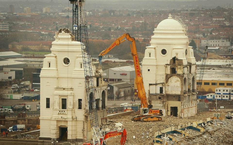 The demolition work on Wembley Stadium's twin towers, 2003 - Reuters