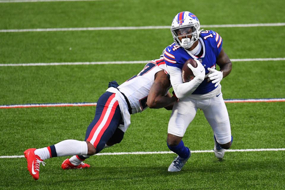 New England defensive back J.C. Jackson tackles Buffalo wide receiver Stefon Diggs during a game earlier this season.